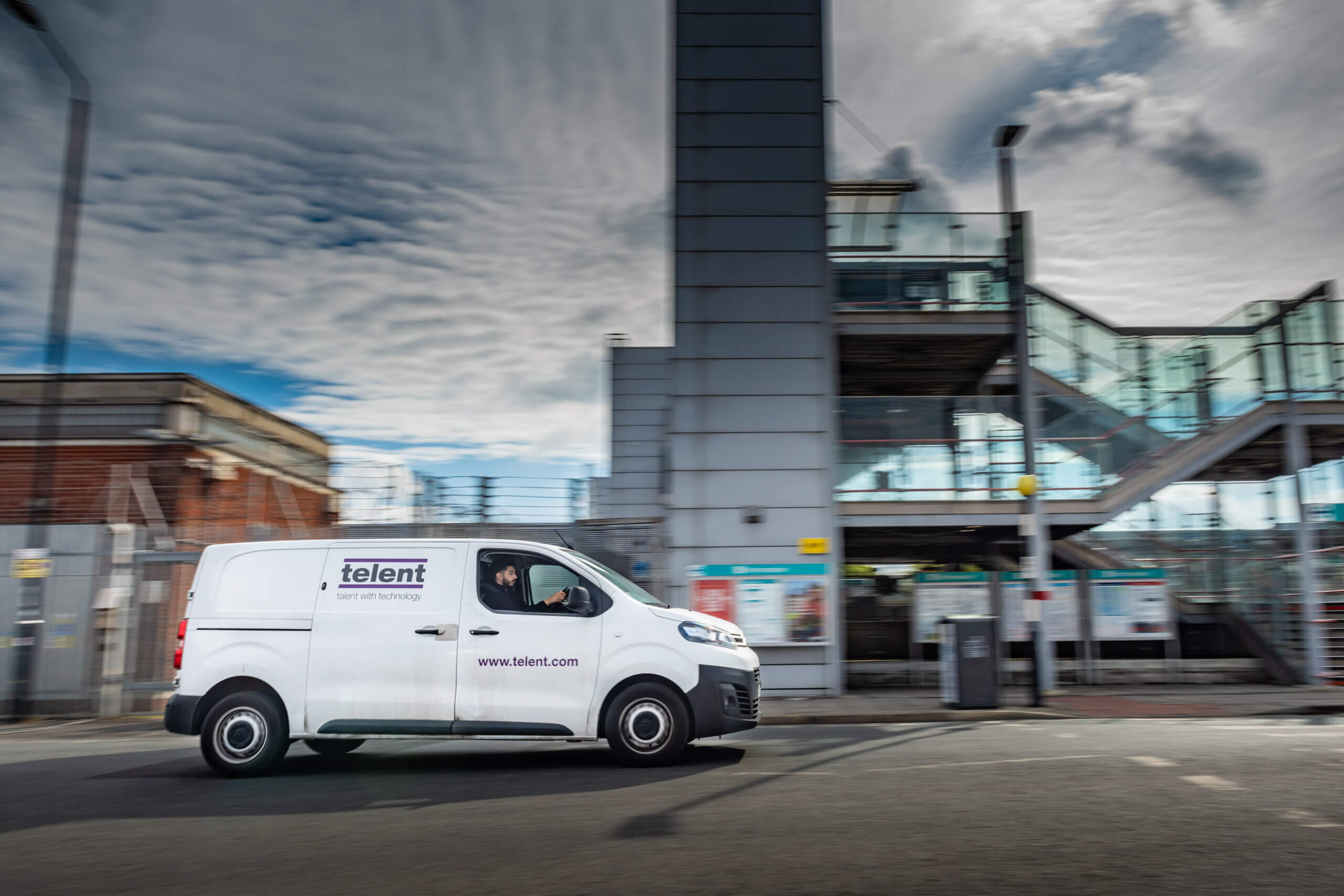 A Telent service van on a road, part of a fleet managed with TTC's driver-risk programme