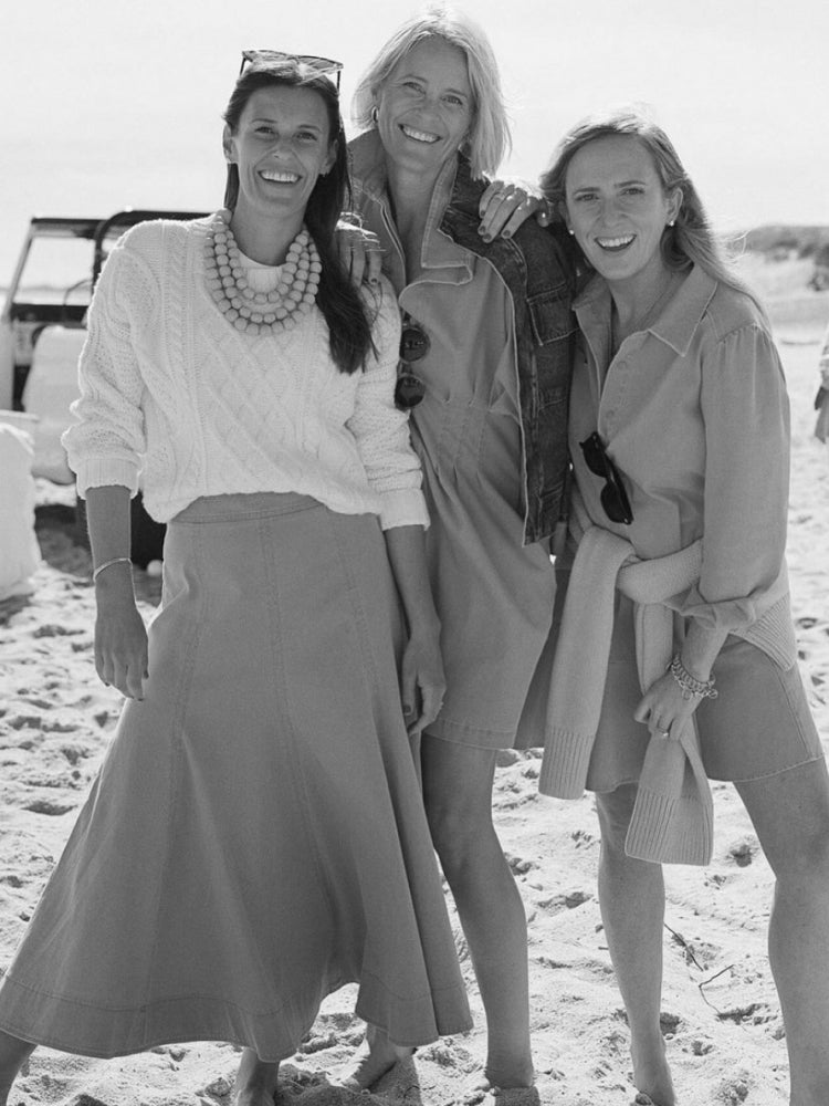 Tuckernuck’s three co-founders together on a beach