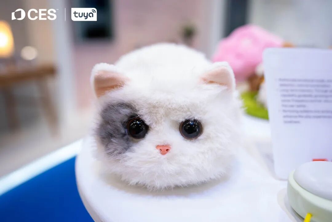 A white AI pet companion displayed at the Tuya CES 2026 booth
