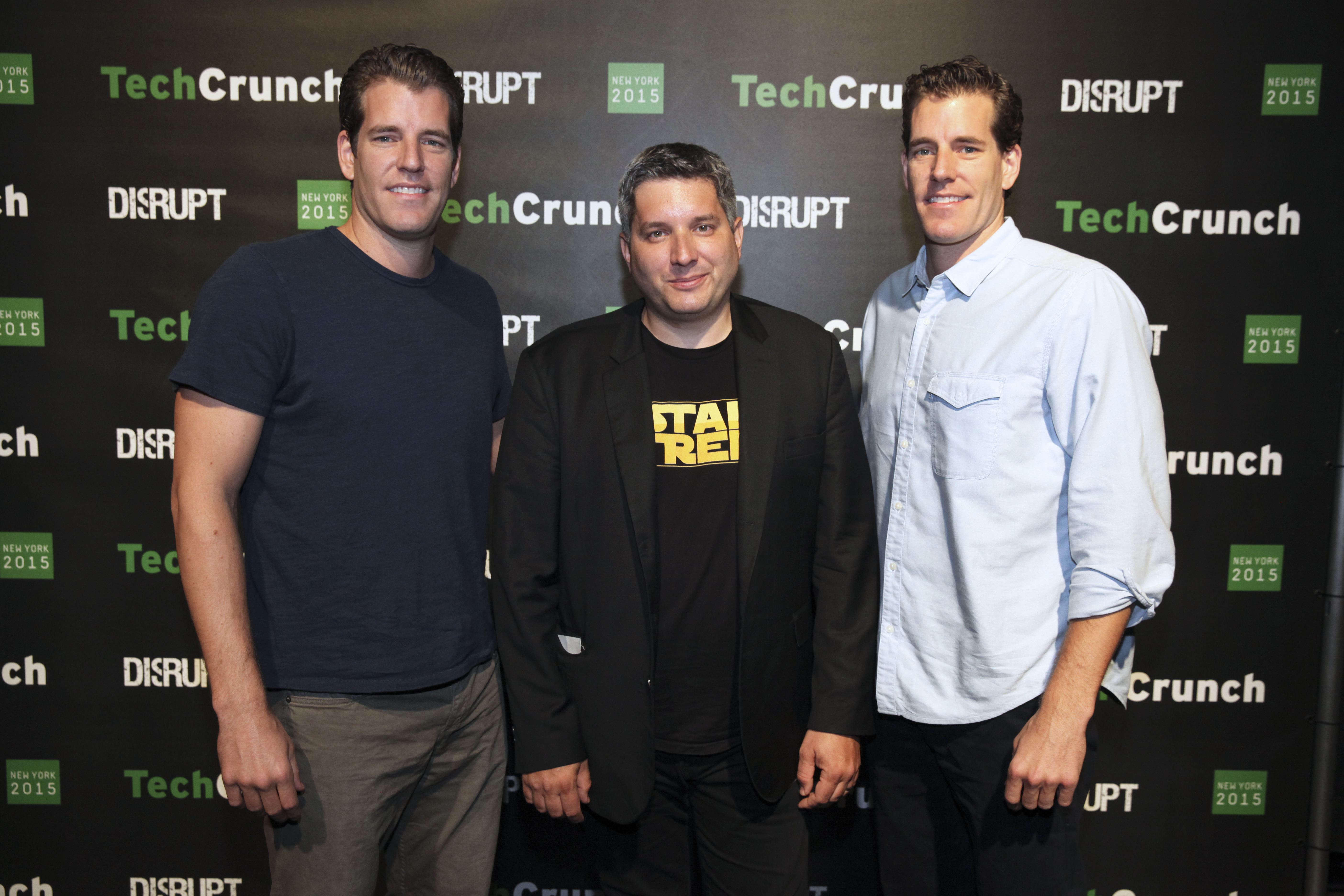The Winklevoss twins with a fellow attendee at TechCrunch Disrupt New York in 2015