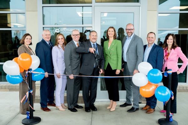 UHS and Trinity Health Michigan representatives at the Southridge ribbon cutting