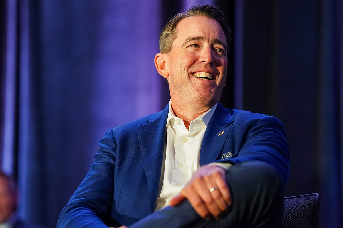Mariner Kemper smiling while seated in a blue jacket