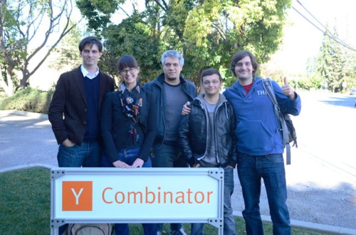 Unbabel’s early team standing behind a Y Combinator sign