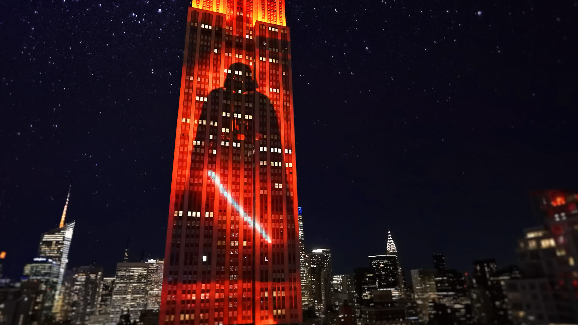 Darth Vader depicted across a red-lit Empire State Building in UNFOLD’s Imperial March campaign image