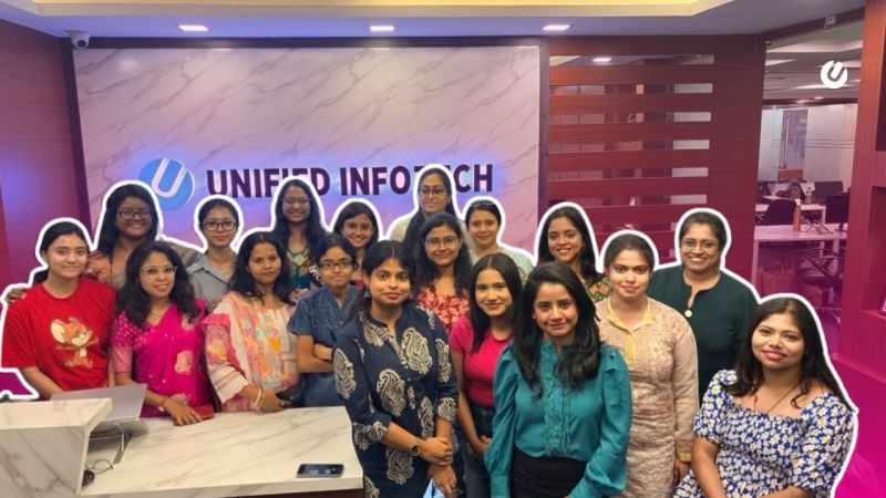 Unified Infotech colleagues gathered at their office reception