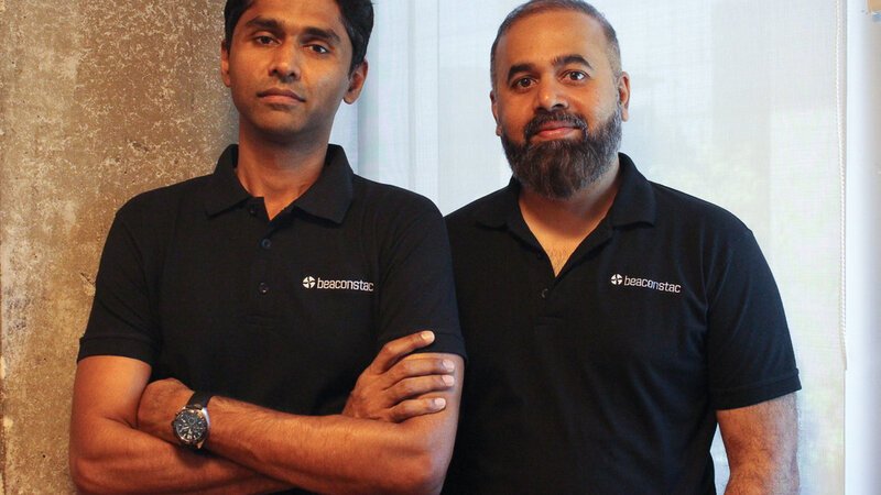 Uniqode co-founders pictured together in their investor’s portfolio