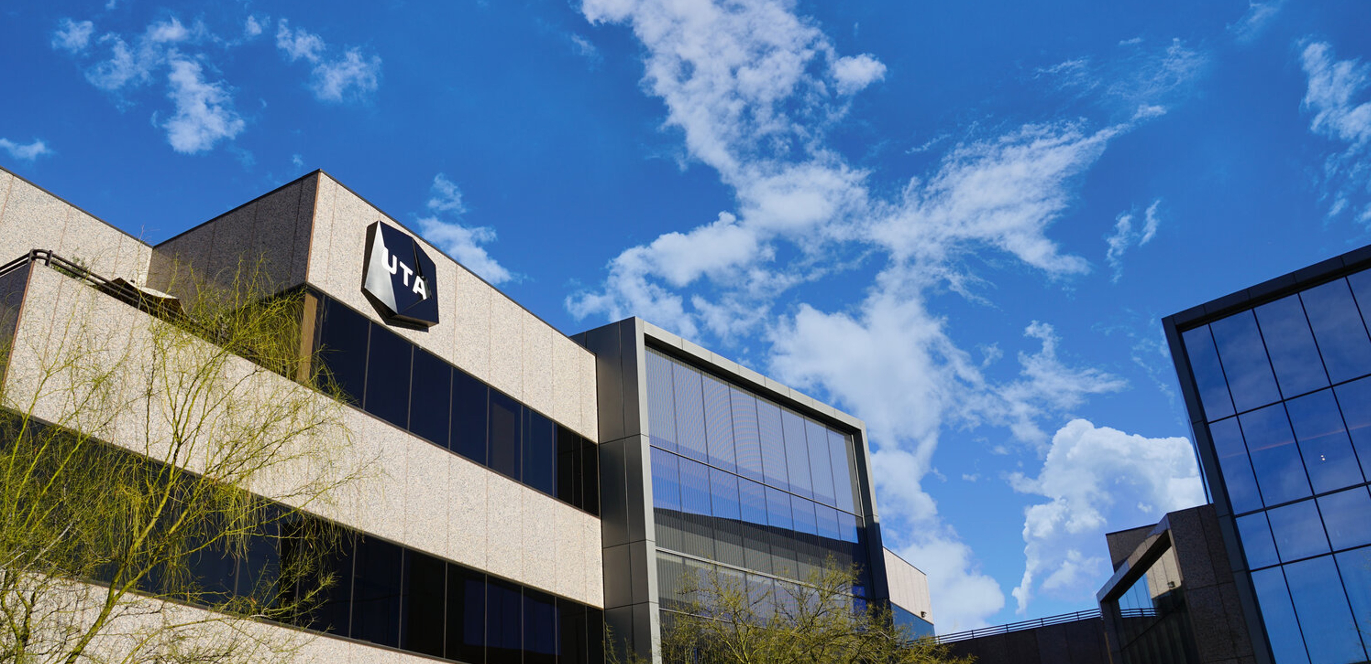 United Talent Agency's Beverly Hills office against a bright blue sky