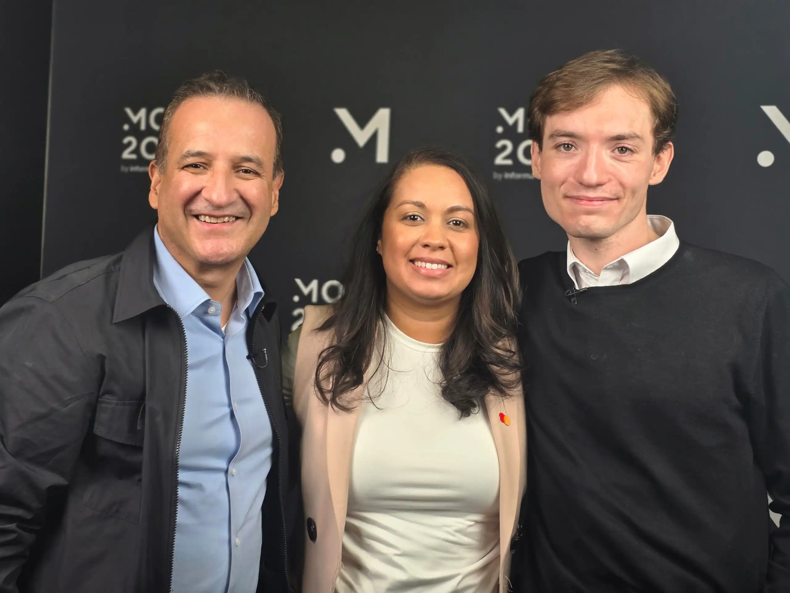 Alberto Guerra, Stefany Bello and an interviewer pictured at Money20/20