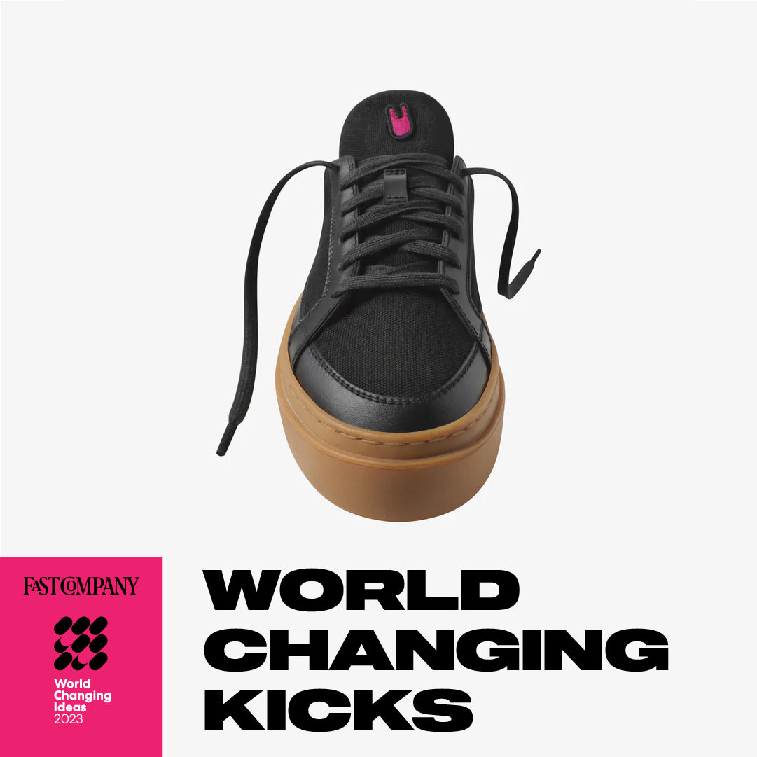 Black UNLESS Degenerate sneaker with gum sole, photographed from the front