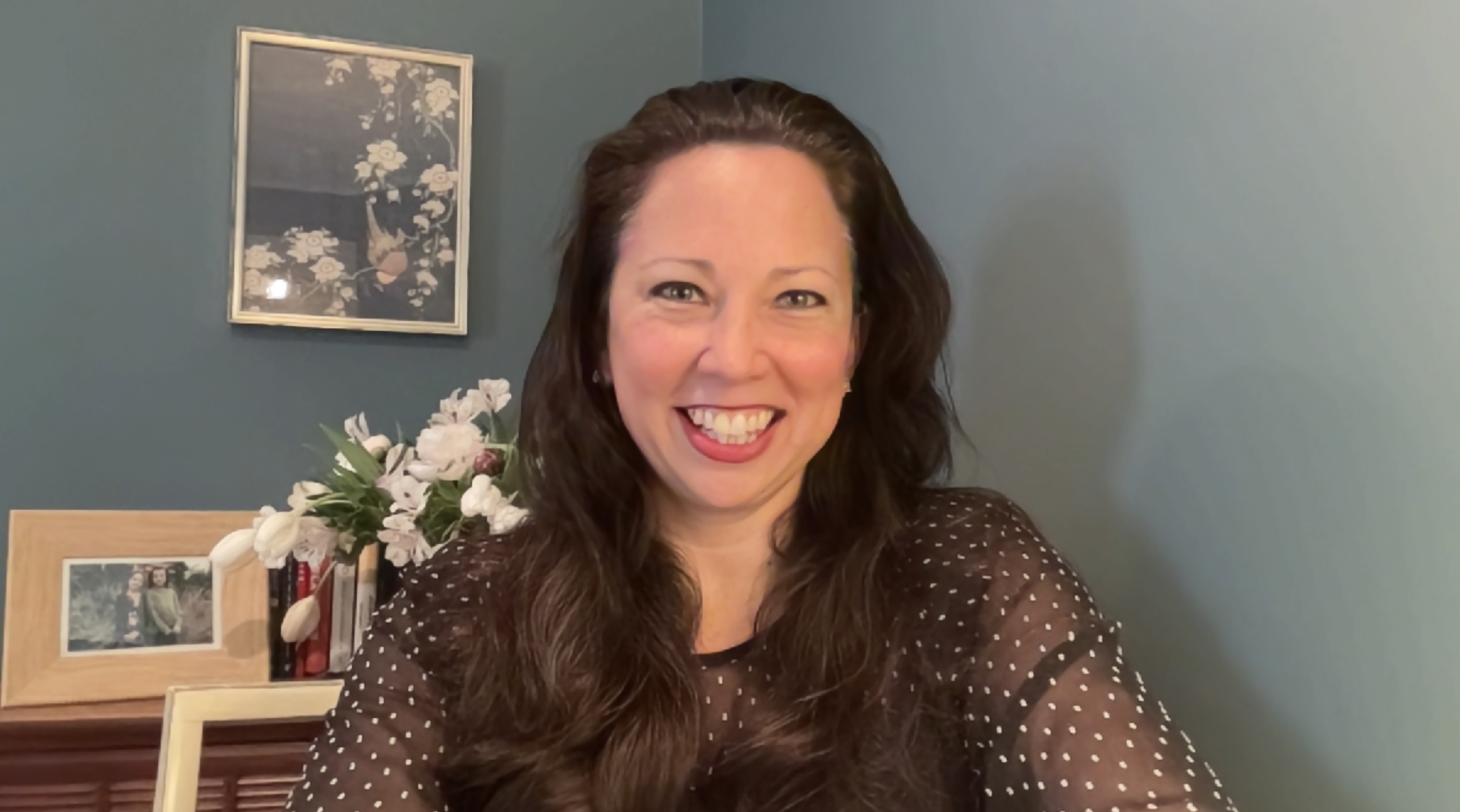 UNLISTED founder Katie Hill smiling in a home interior