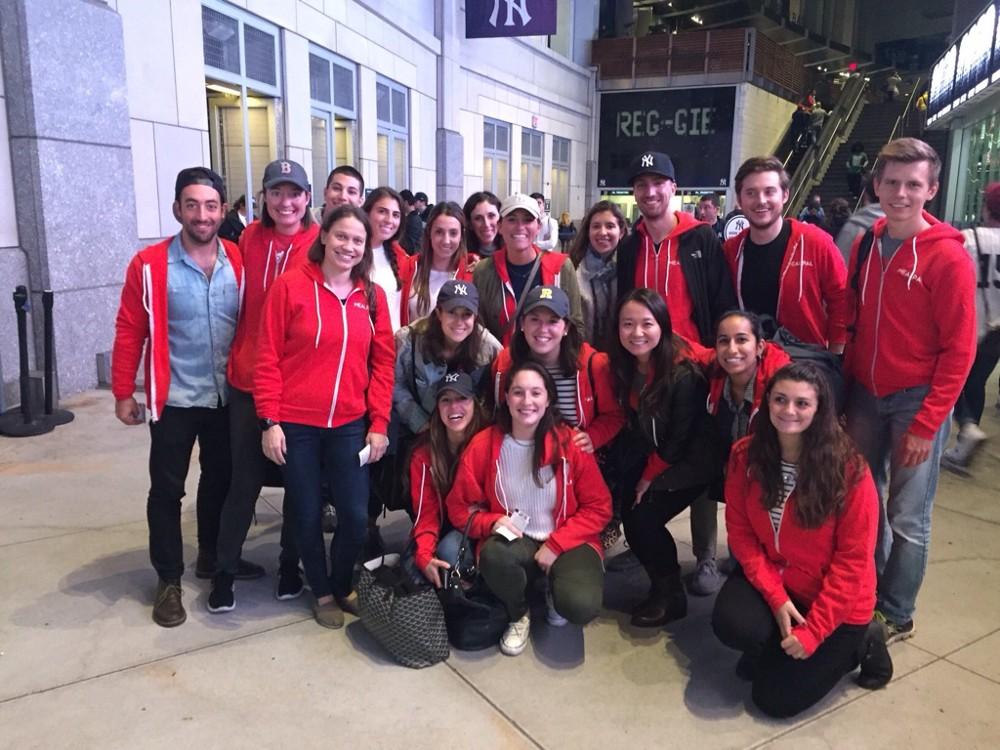 MealPal colleagues in red hoodies gathered during the New York team visit