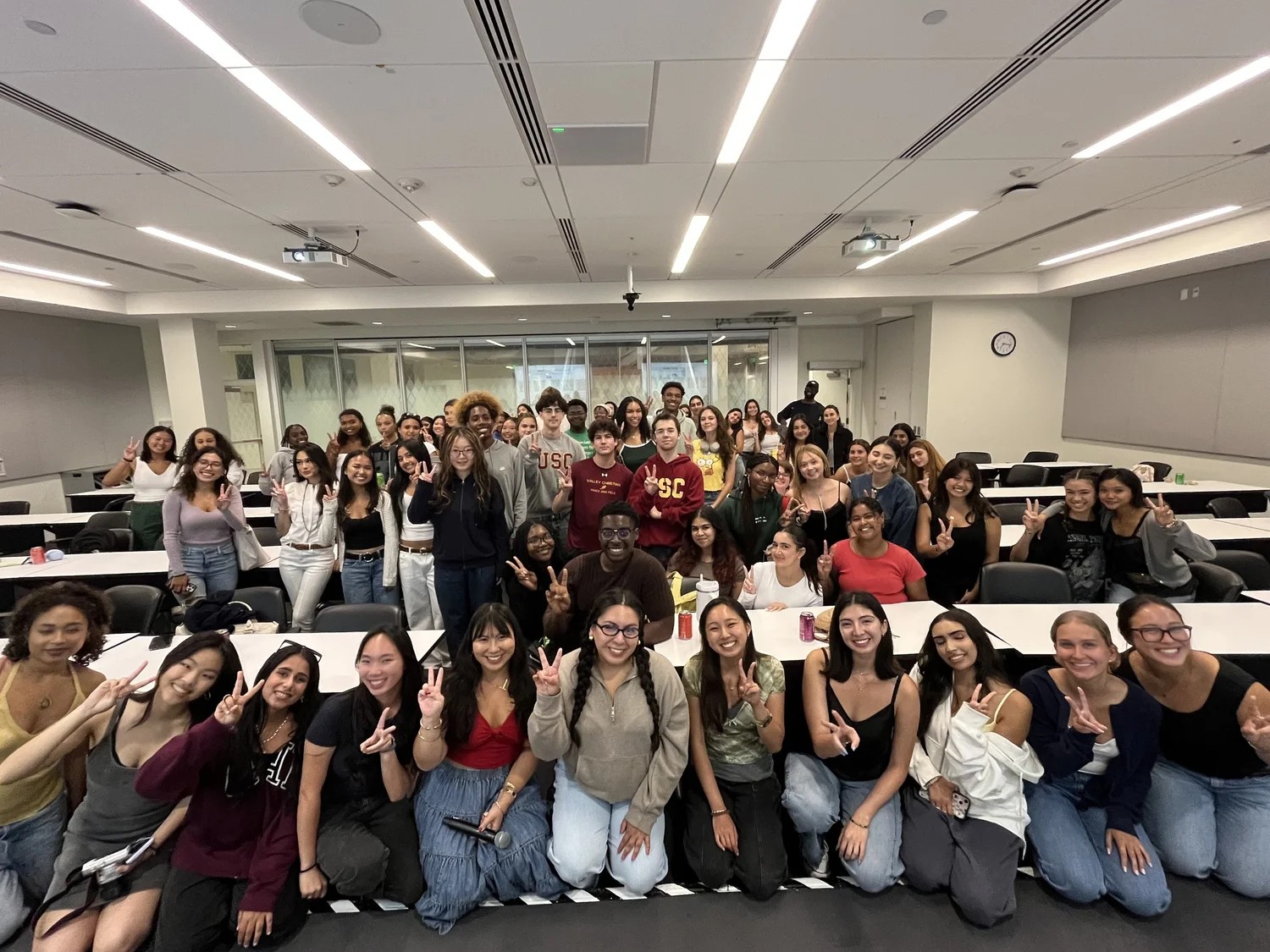 A large group of USC PRSSA students gathered in an Annenberg classroom