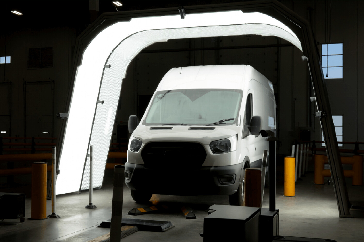 A vehicle passing through a UVeye automated inspection lane