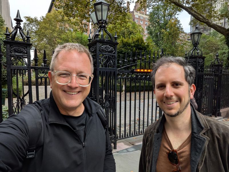 Ted Merz, left, and Vadim Telyatnikov, right, beside the railings of Gramercy Park in New York