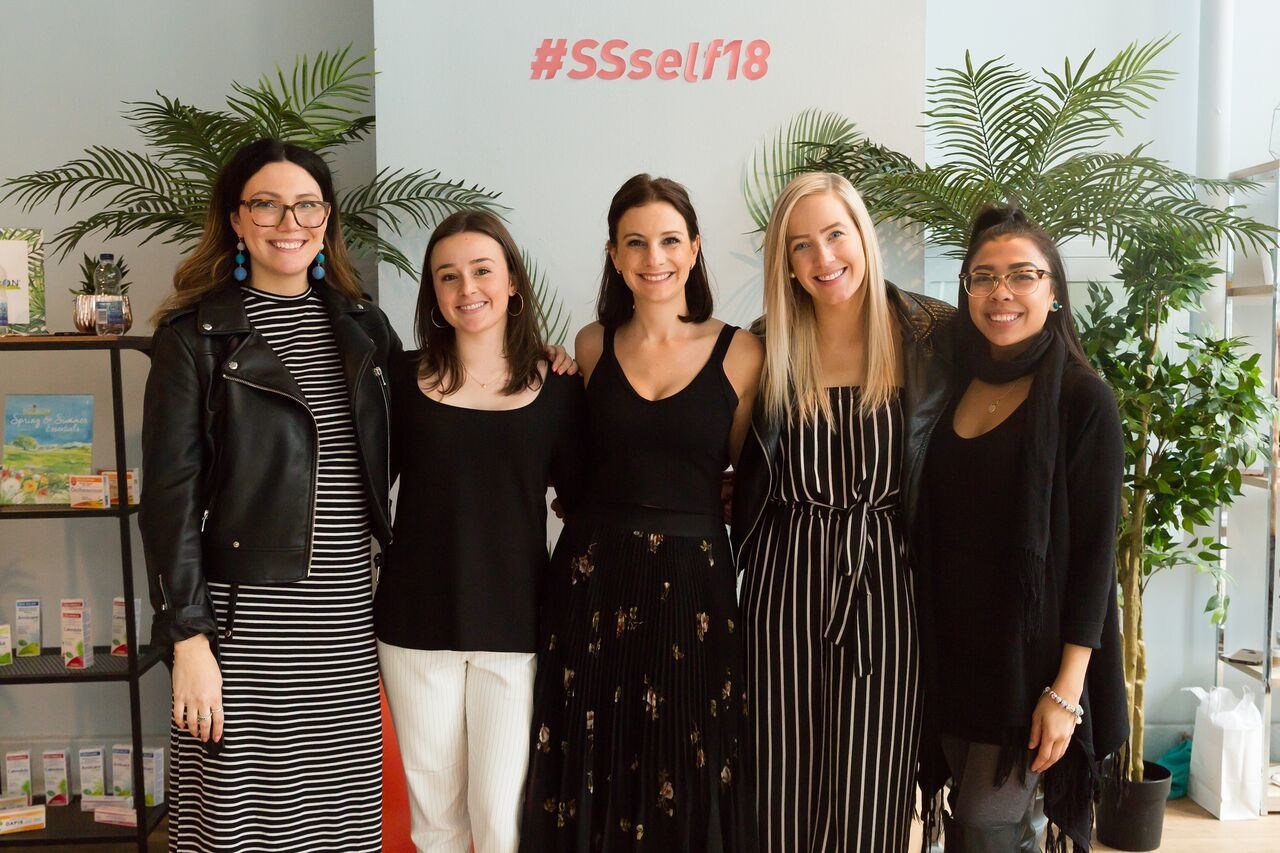 Valerie Stachurski, center, with the Charming Media team at its 2018 spring and summer self-care showcase