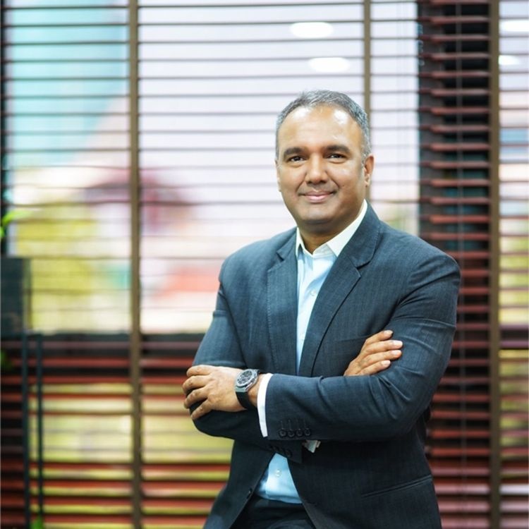 Gaurav Sahu, managing director of Valueonshore Advisors, standing with his arms folded