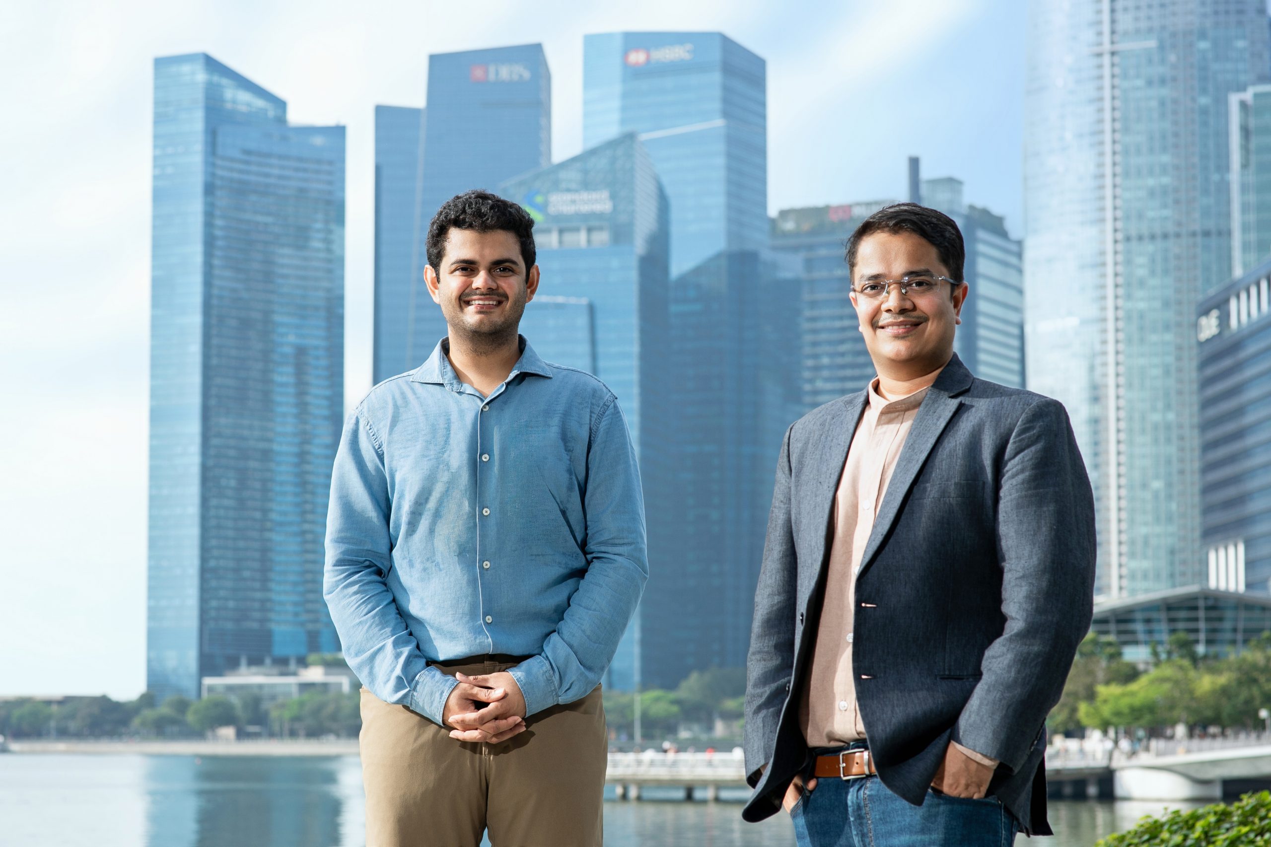 WhyQ co-founders Rishabh Singhvi, left, and Varun Saraf, right, beside Singapore’s waterfront
