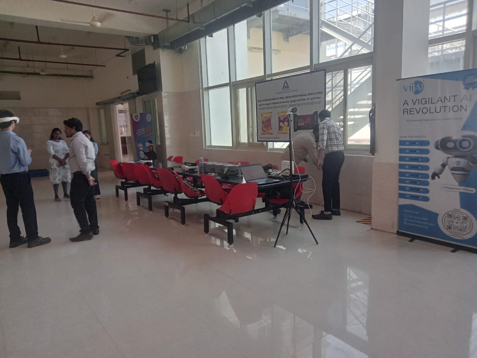 People taking part in a Drona VR deployment demonstration in an industrial training room