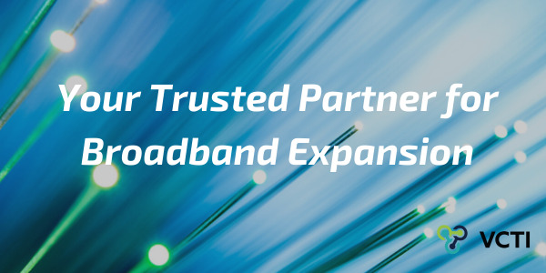 Blue fiber-optic strands in an official VCTI broadband expansion visual