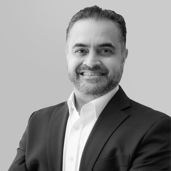 Mohamed Irfan Peeran, CEO of VDart Digital, in an official black-and-white portrait