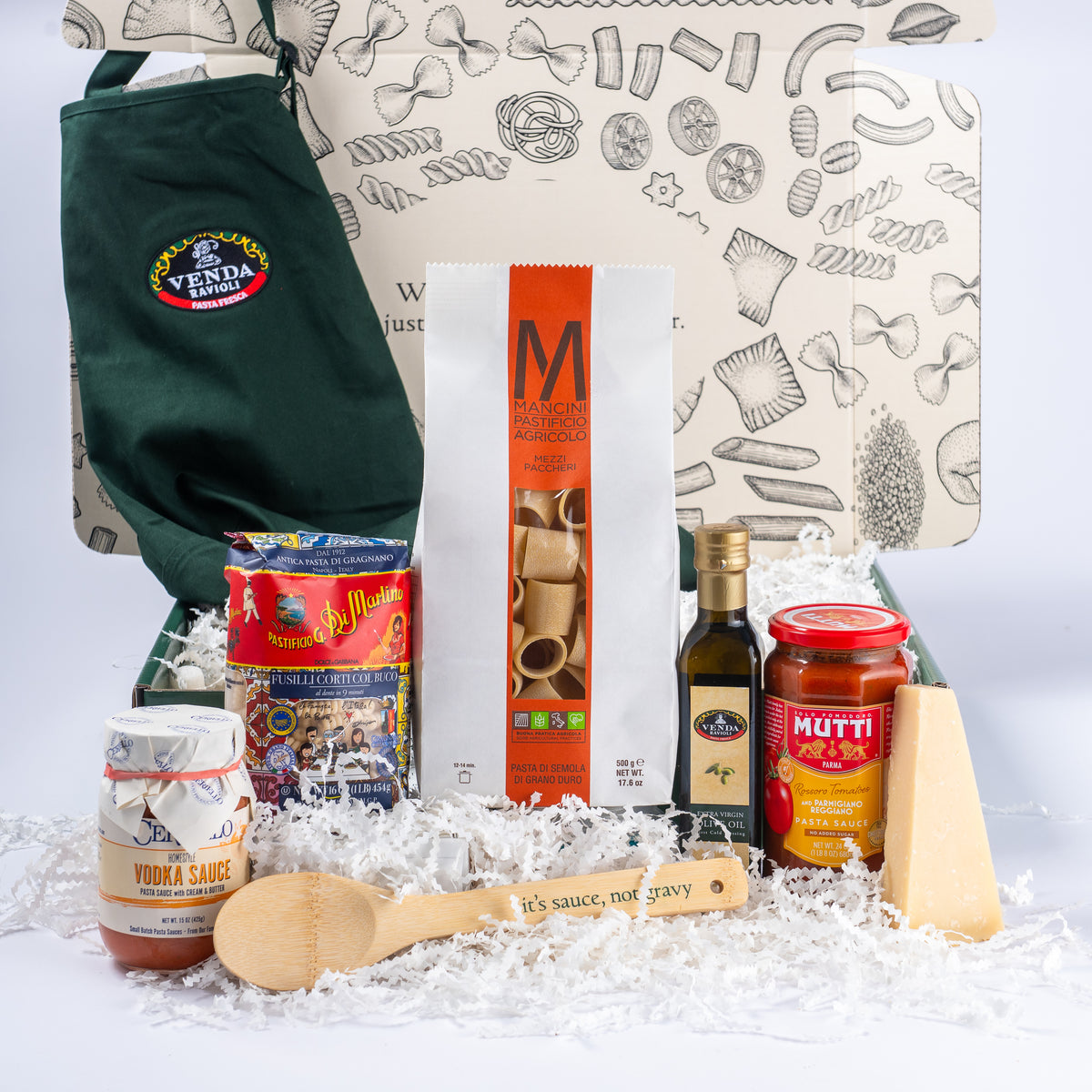 Venda's Italian Pasta Night Gift Box with pasta, sauces, olive oil, cheese, apron and wooden spoon