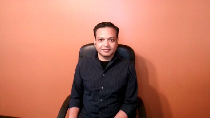 Venkat Krishnamachari seated during his 2021 theCUBE interview