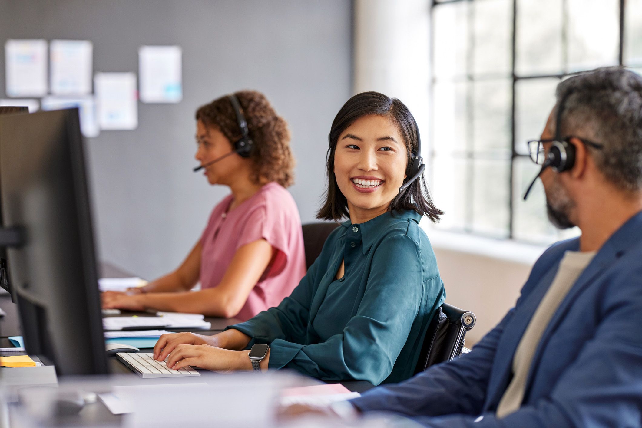Venture employees discussing work together