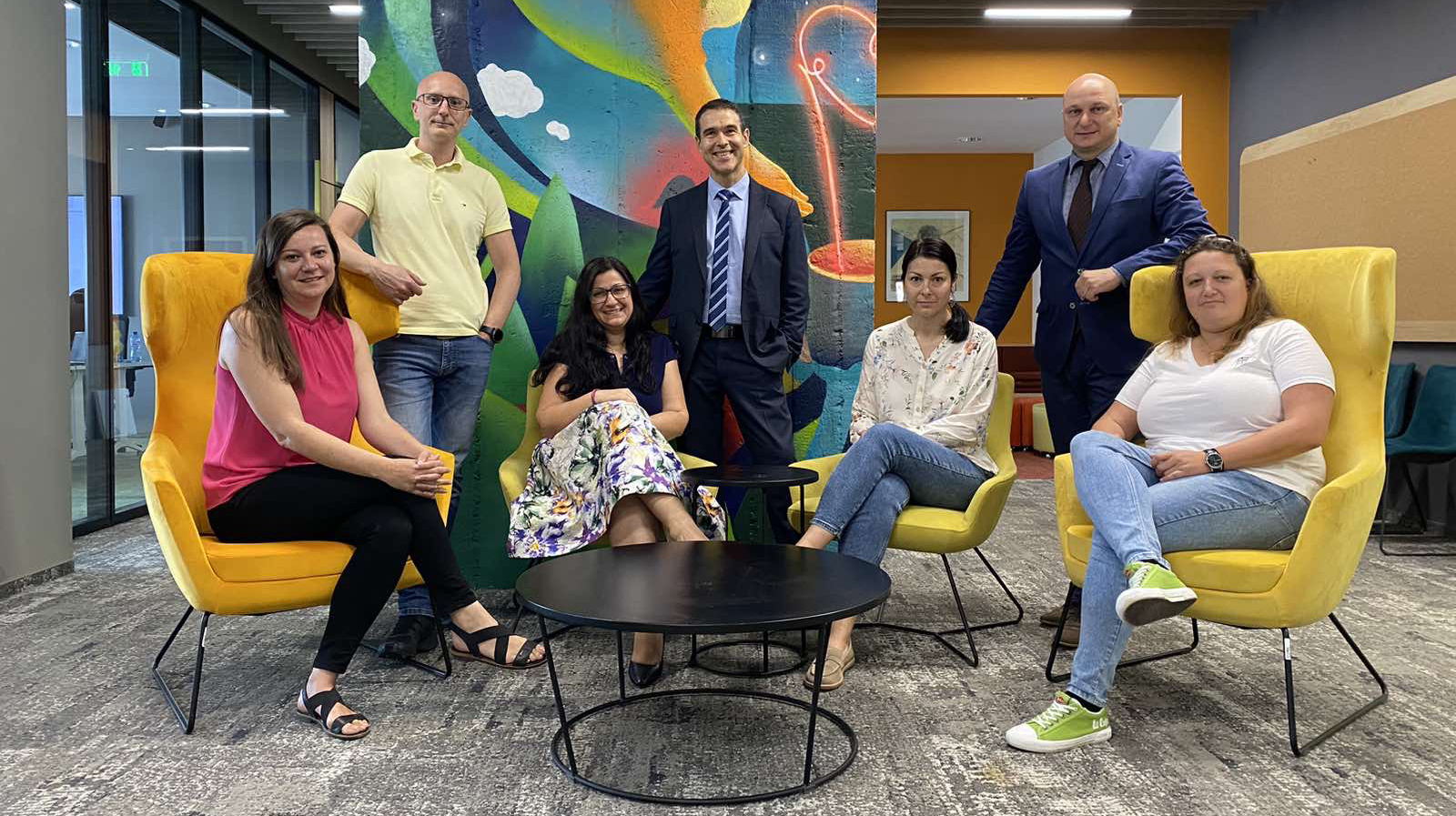 DSK Bank and VeriPark team members seated together in a modern office