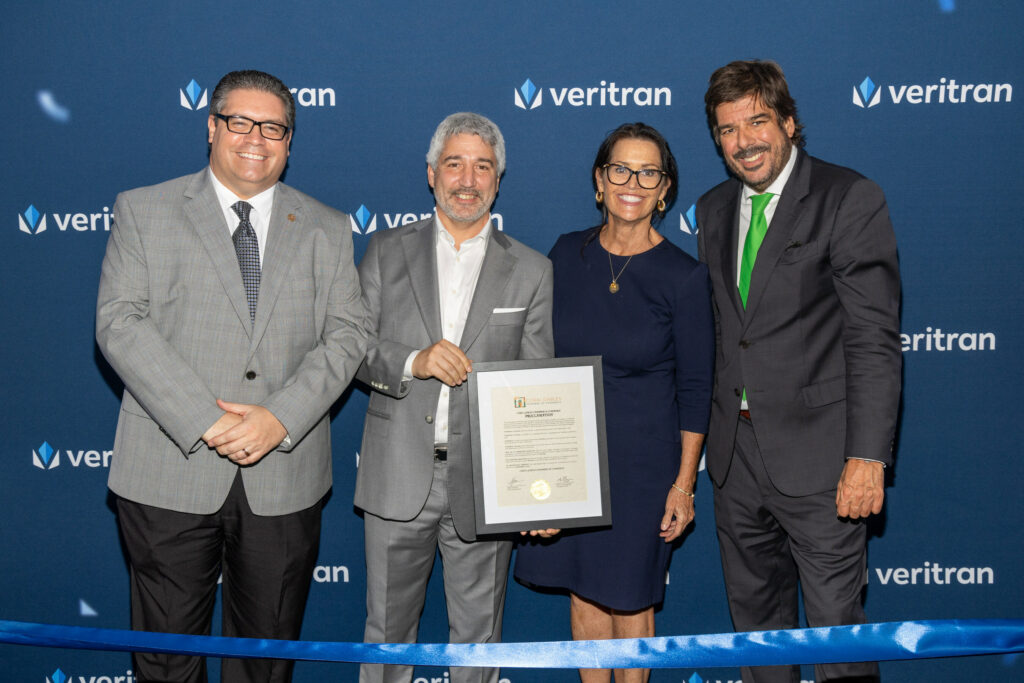 Marcelo González with local representatives at the Coral Gables office ribbon cutting
