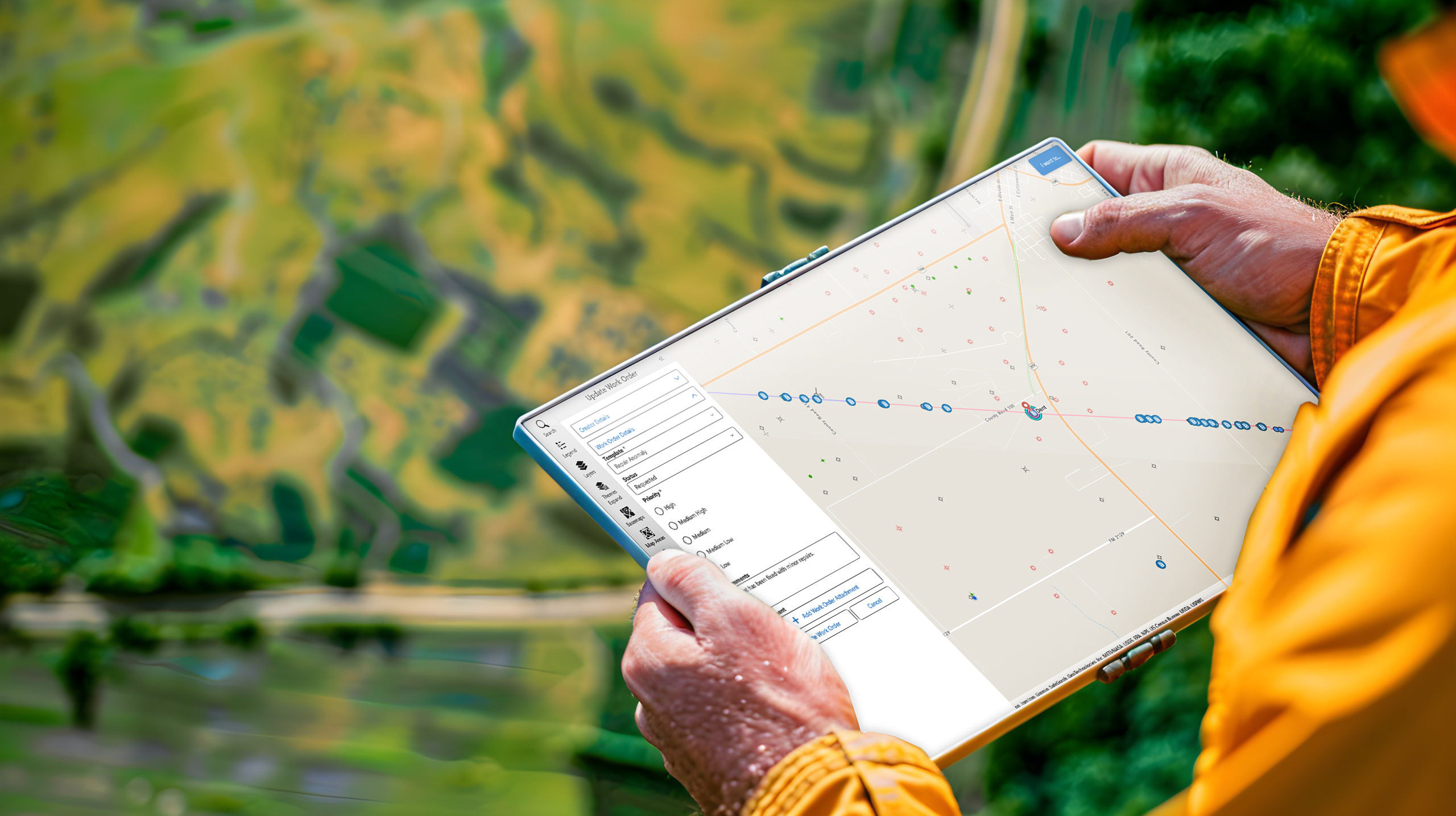 Field worker using a tablet with a VertiGIS mapping application