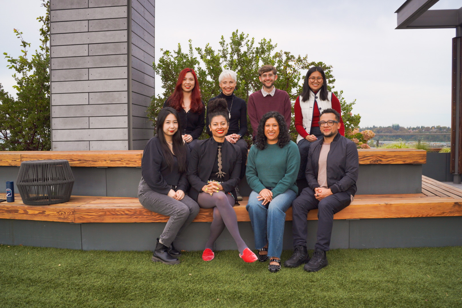 VertueLab team members gathered outdoors on a terrace