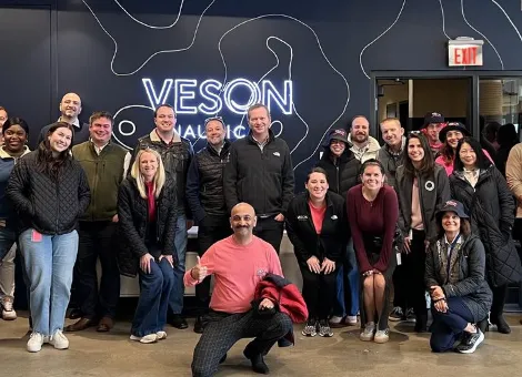 Group photograph from Veson Nautical’s company-event gallery