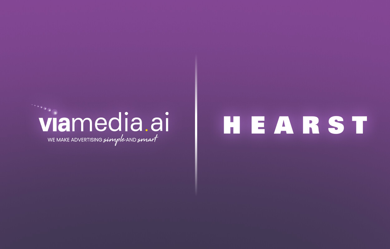 Viamedia.ai and Hearst logos side by side on a purple field