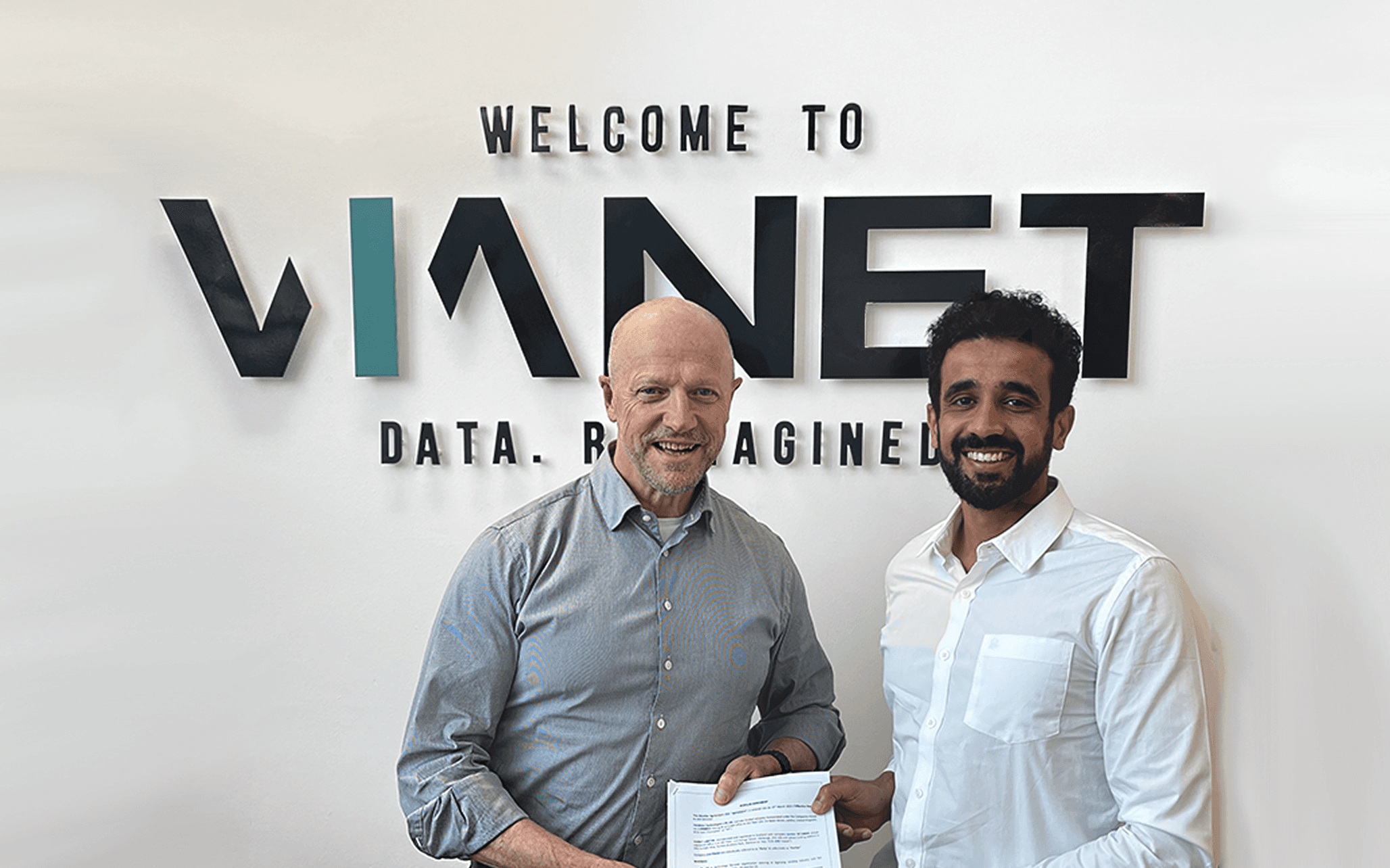 James Dickson and Aroon Khatter marking the Vianet and Vendekin partnership in 2023