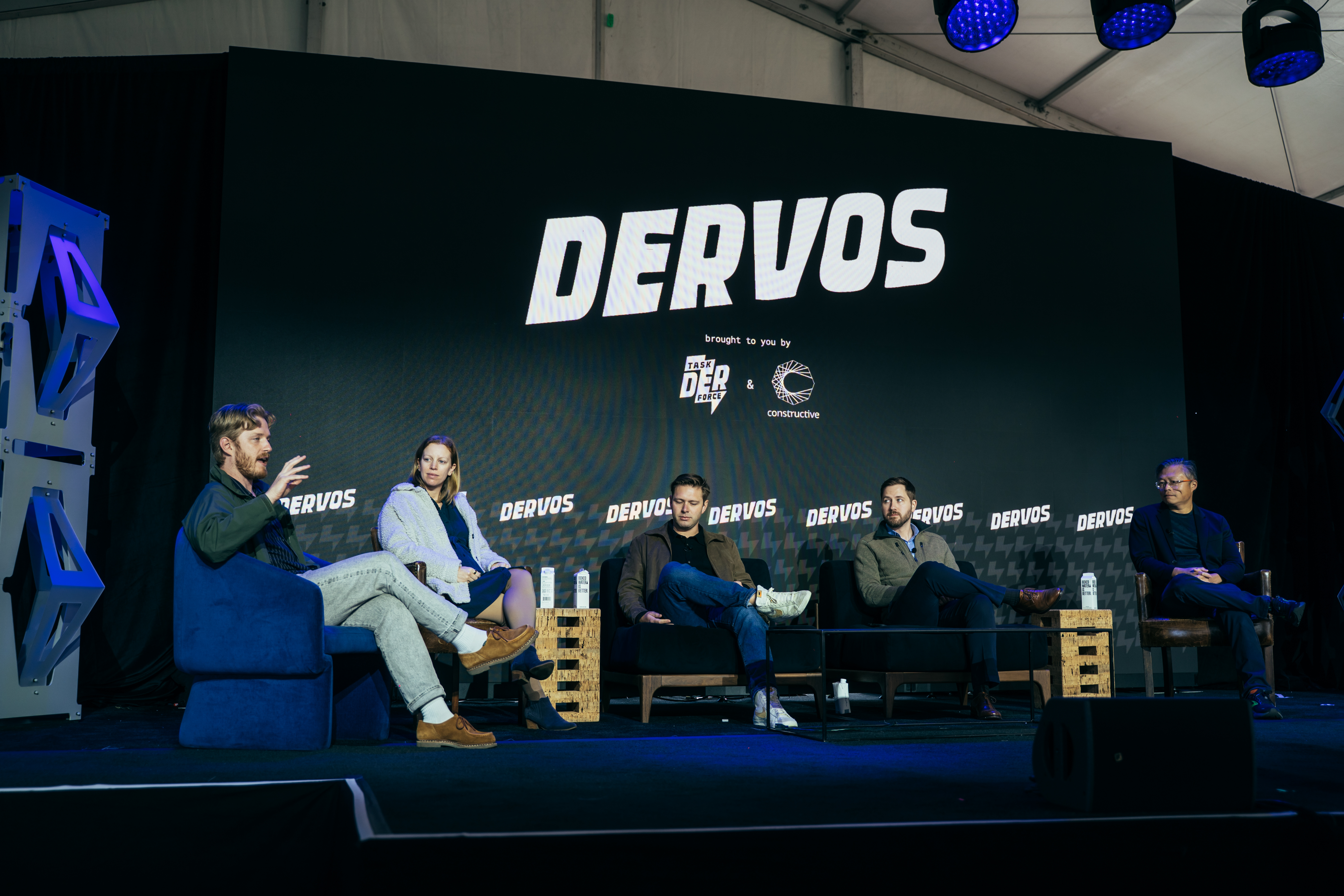 Vic Shao, seated at far right, joins four other speakers on the DERVOS 2025 stage