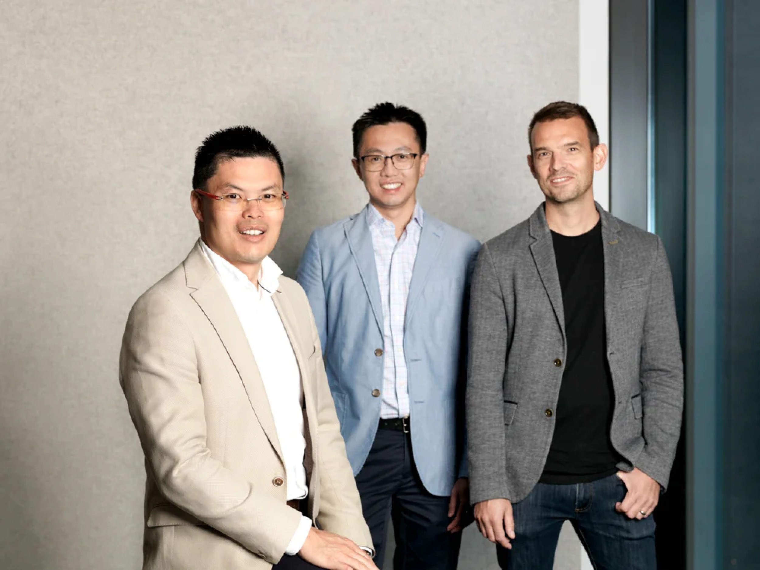 mx51 founding team posing together: Victor Zheng, Magnus Hsu, and Steven Hadley
