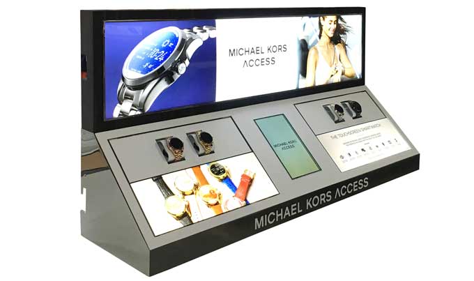 Michael Kors Access watch display with illuminated graphics and an integrated digital screen