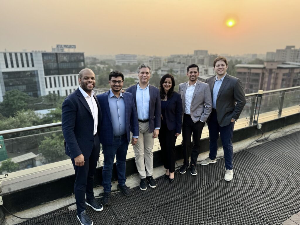 VideoVerse executives and Bluestone investors together on a terrace in the December 2023 investment announcement