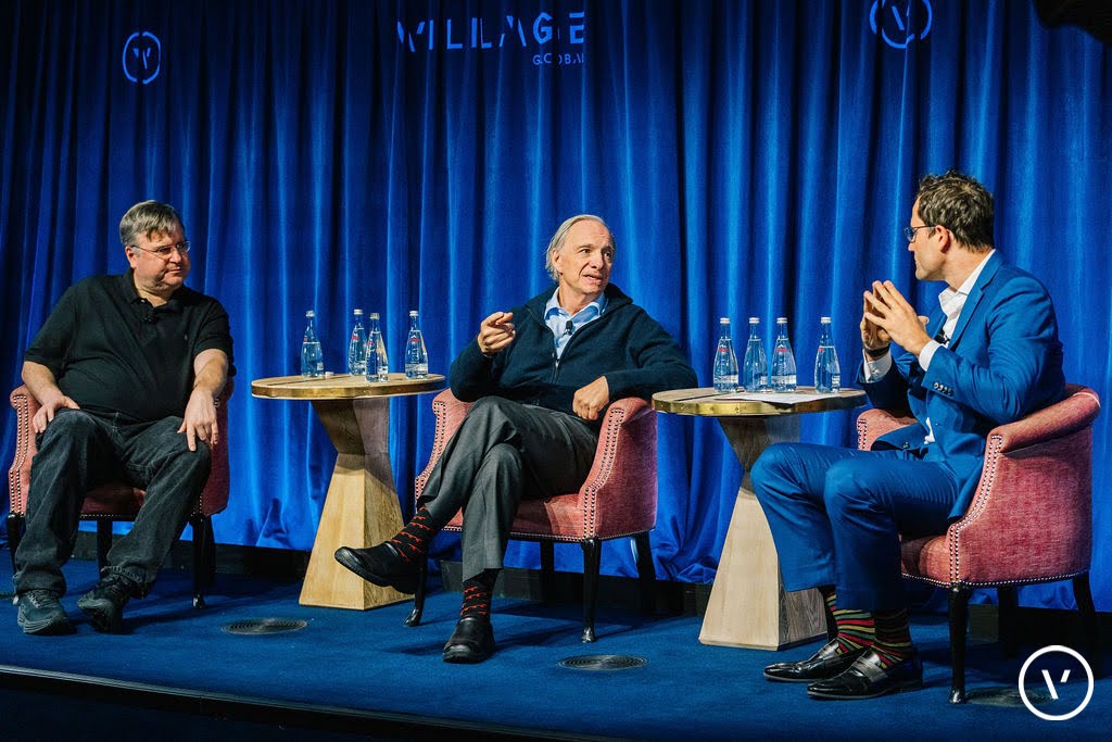 Reid Hoffman, Ray Dalio, and moderator Ben Casnocha seated at Village Global’s New York event
