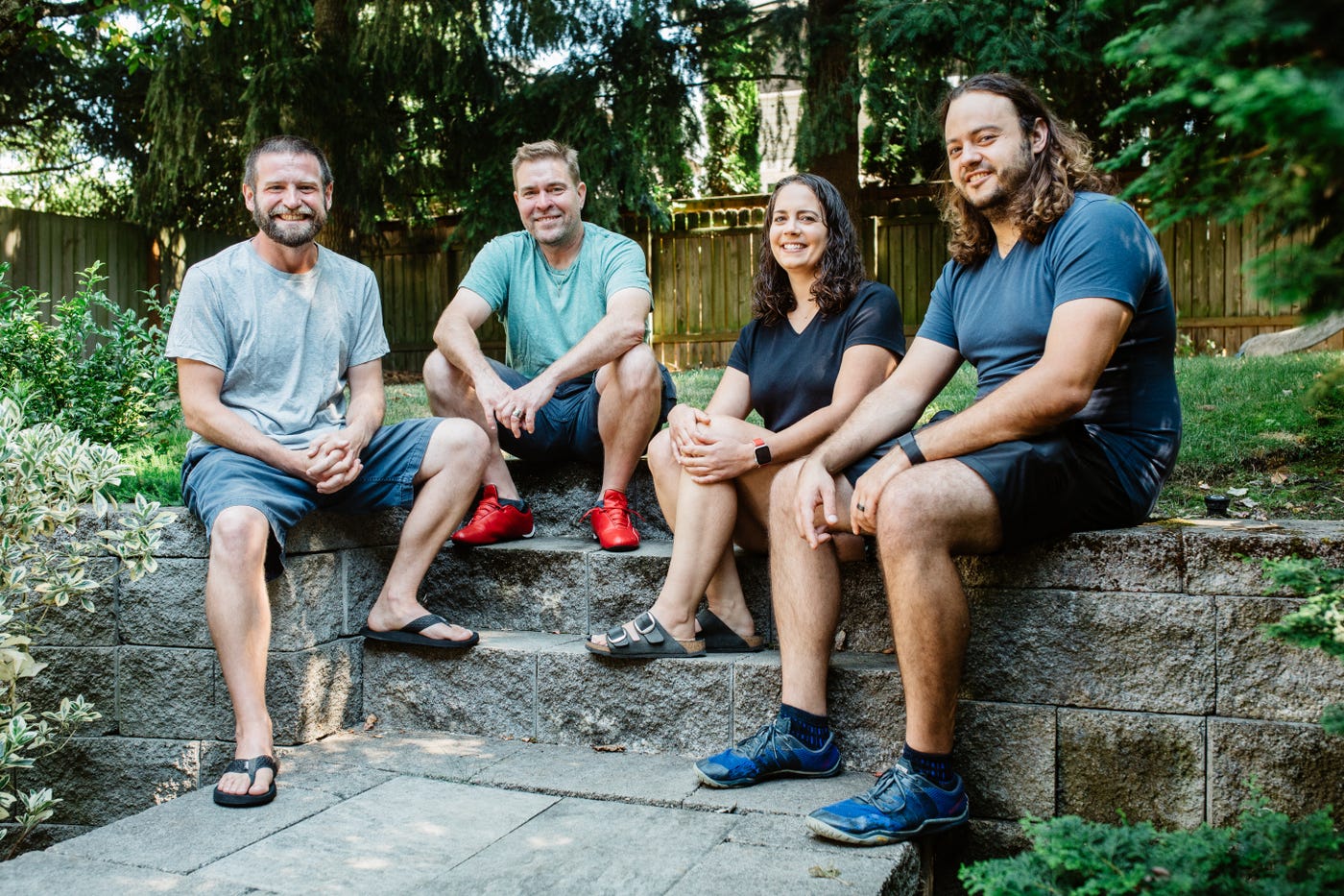 Chainguard co-founders seated outdoors, with Ville Aikas second from left