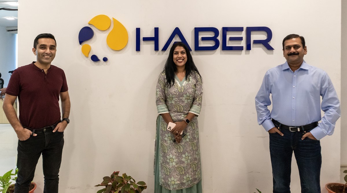Vipin Raghavan, Priya Venkat and Arjunan P N standing together at Haber