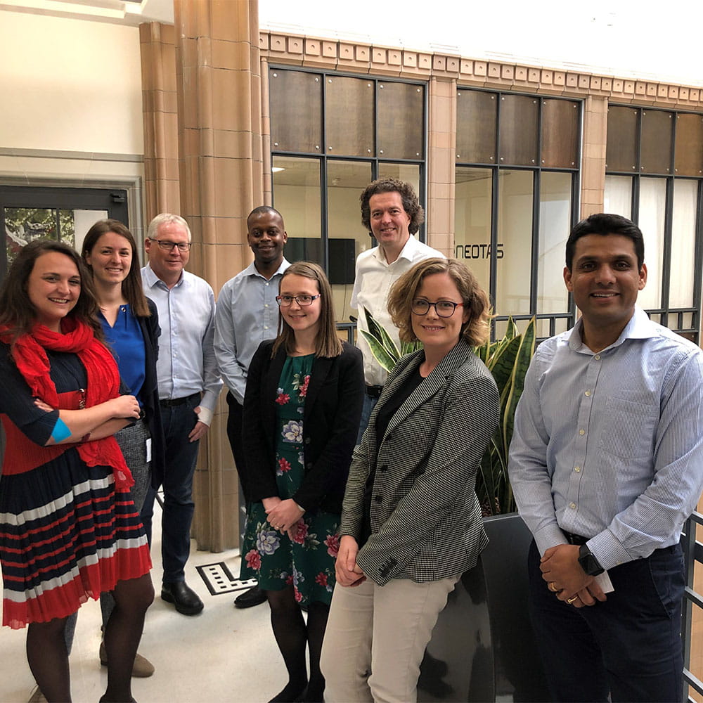 Vipul Mishra, at right, with members of the Neotas and University of Essex collaboration