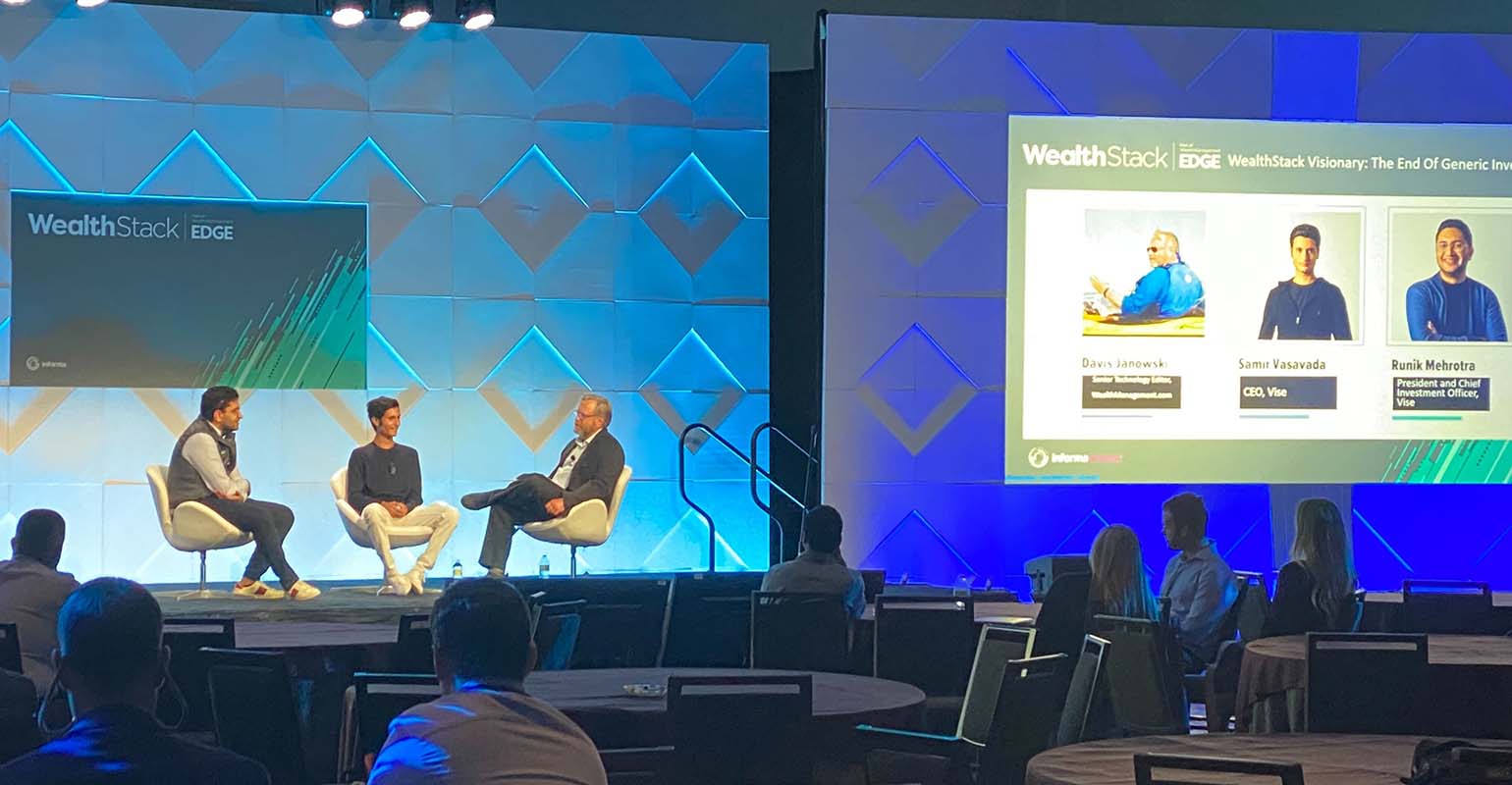 Vise co-founders seated with interviewer Davis Janowski at the 2022 WealthStack conference