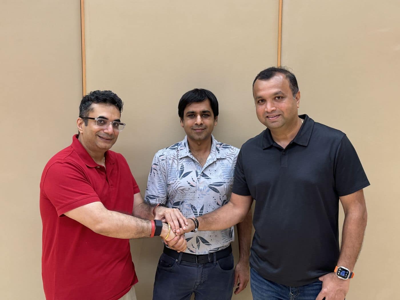 Vishal Gondal, Nitish Mittersain and Deepak Ail standing together with their hands joined