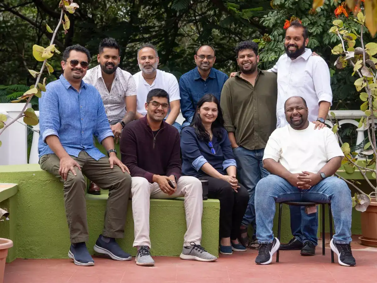 Vishnu Vasanth, seated second from left, with members of the e6data founding team outdoors