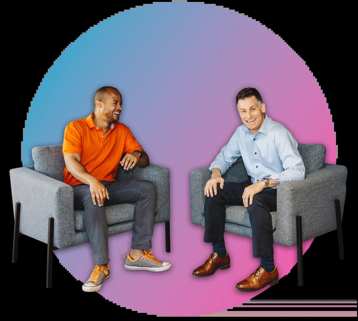 Vito Solimene seated at right in conversation with a colleague in a Nextworld company photograph