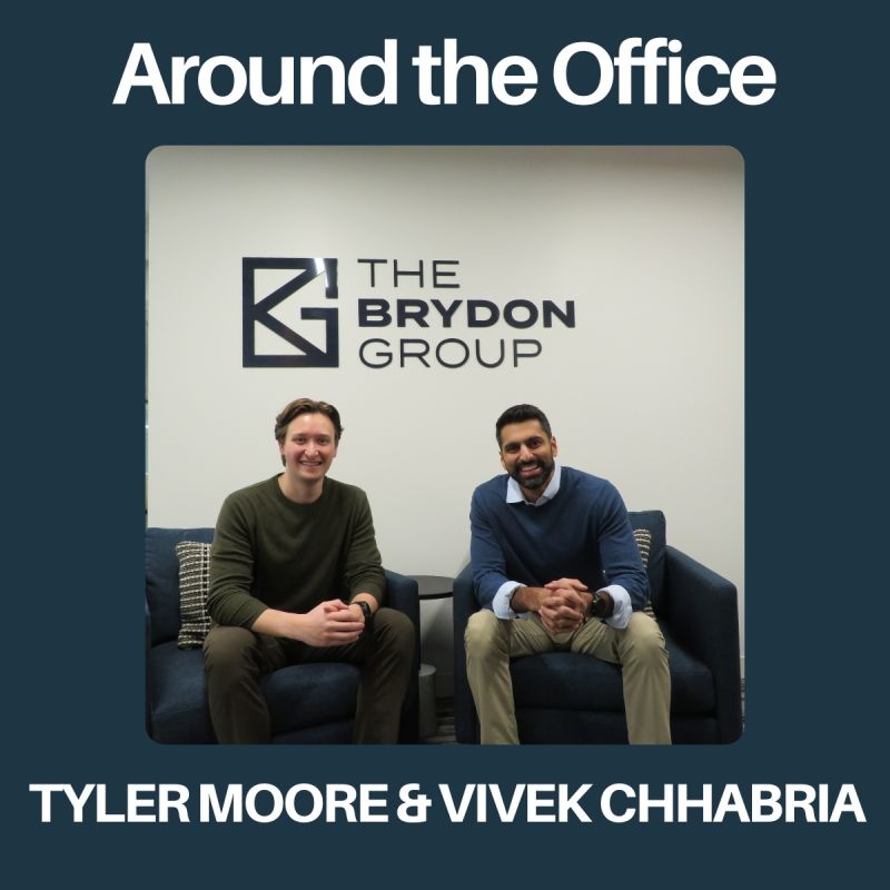 Tyler Moore, left, and Vivek Chhabria seated at The Brydon Group office
