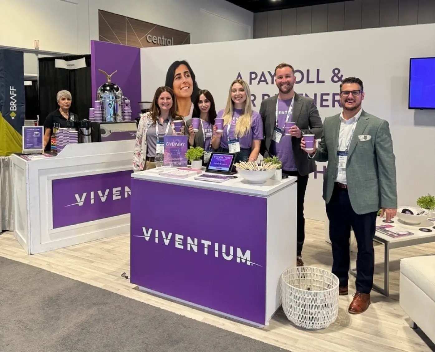 Members of the Viventium team posing together at an event