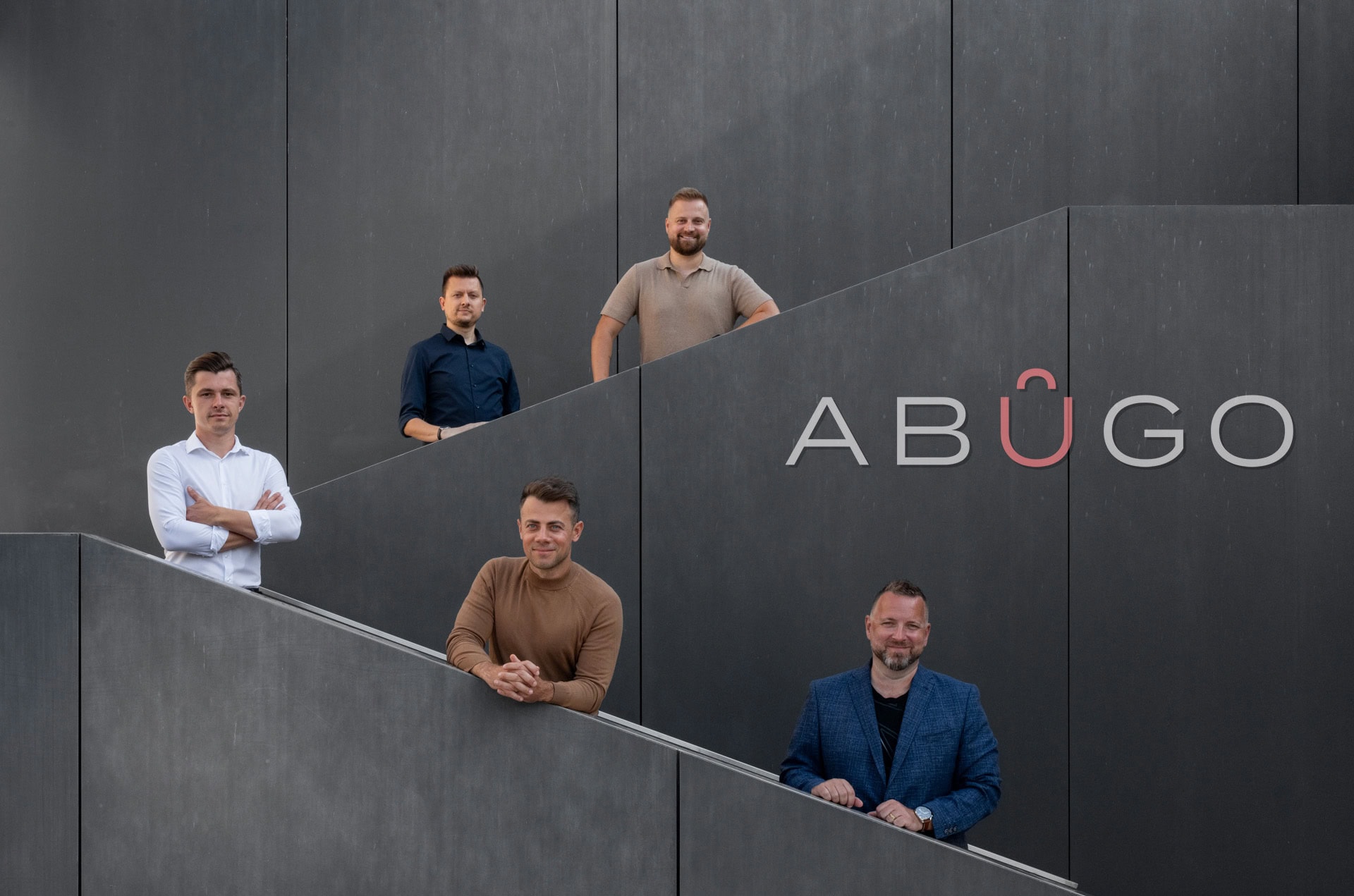 Five founders and executives of the businesses forming ABUGO, including Vladimir Sandera at the right