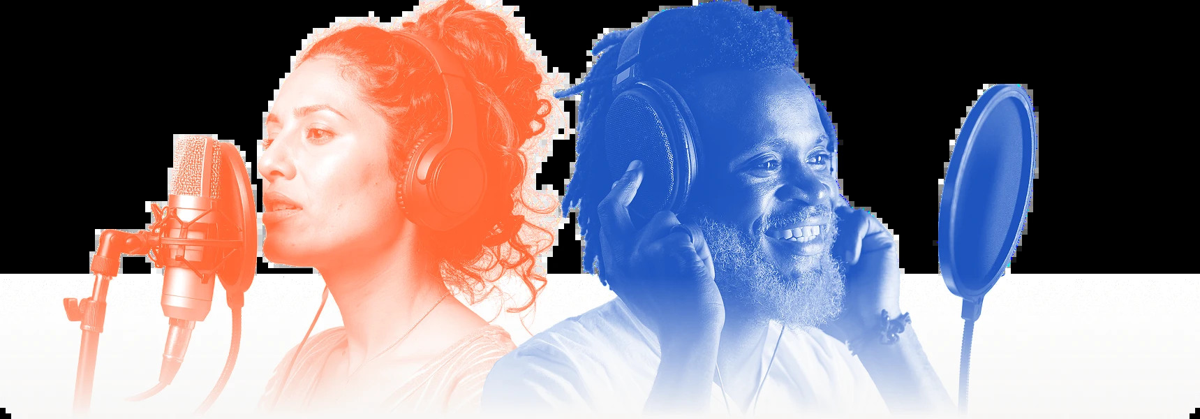 Two professional voice actors wearing headphones and recording at microphones
